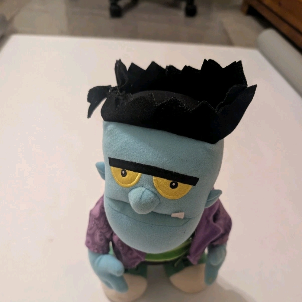 Hallmark Blue Monster Plush with Black Hair and Yellow Eyes